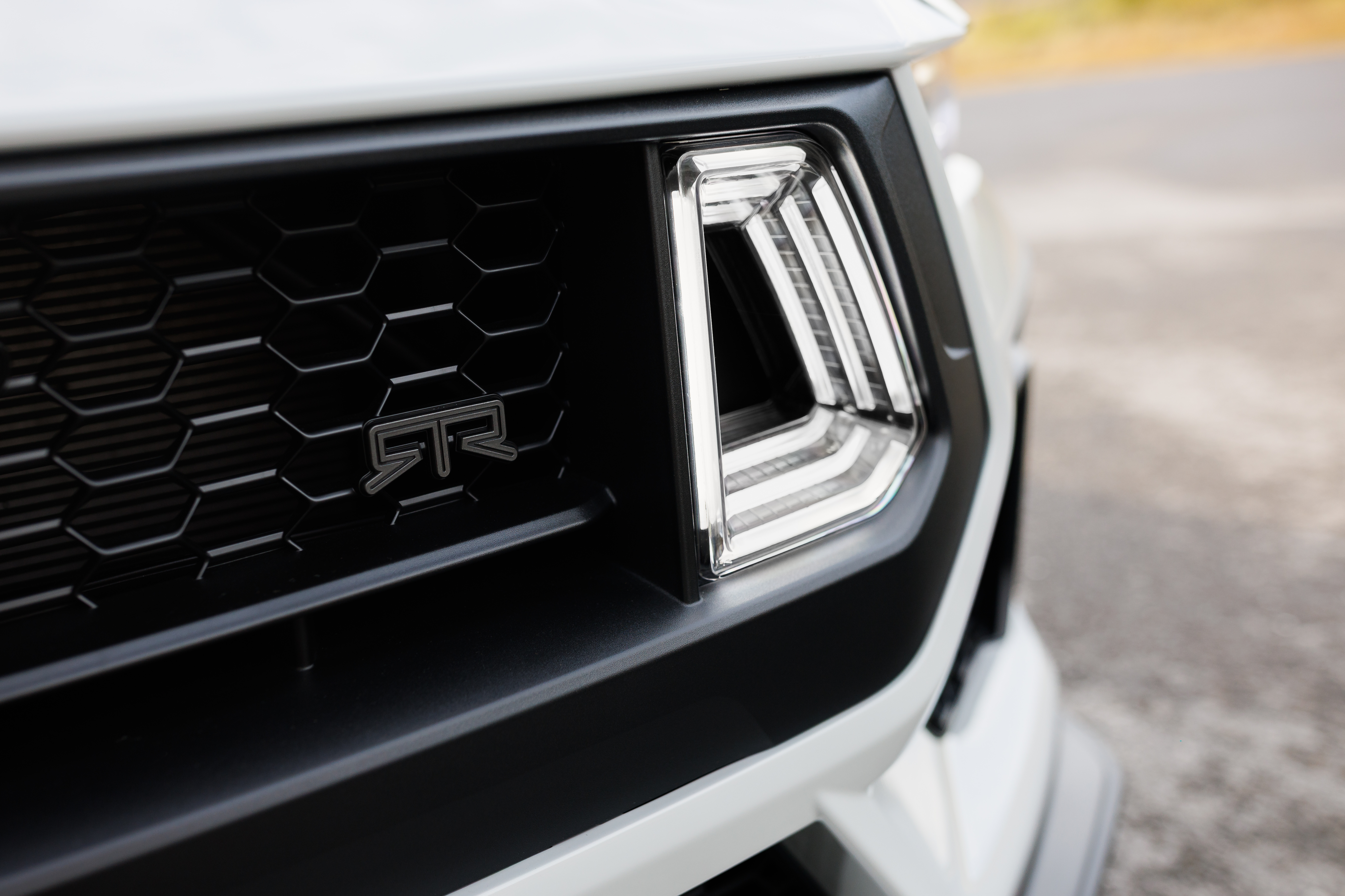 Optional RTR package available on 2026 Ford Mustang EcoBoost fastback.Preproduction model shown. Available late spring 2026.